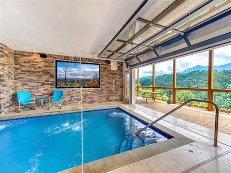 a splash of heaven is a newly constructed, 6 bedroom, 7 bath cabin featuring 5000 sqfeet of space with a private indoor heated pool. . Airbnb gatlinburg with private pool
